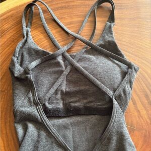 Bombshell Sportswear Gray Jumpsuit with Intricate Strap Design
